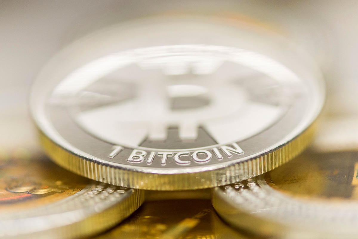 Virtuelles Geld: Münzen der virtuellen Währung Bitcoin, aufgenommen am 10. Januar 2014 an der ETH in Zürich, Schweiz. Foto: Keystone-SDA / Ennio Leanza 